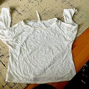 White striped lululemon long sleeve shirt. Sheet between the stripes.